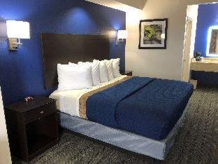 Executive Inn And Suites Joaquin Quarto foto